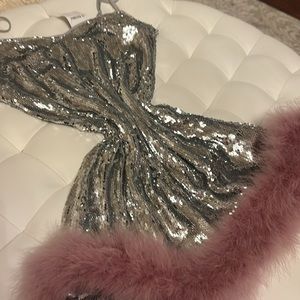 Party Dress. New with Tags. Available in S, M, L.